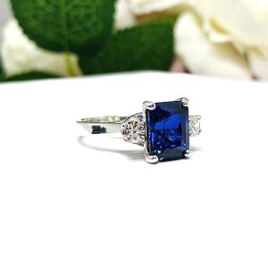 Lab Blue Sapphire Radiant Ring with Round CZ Accents Size 7