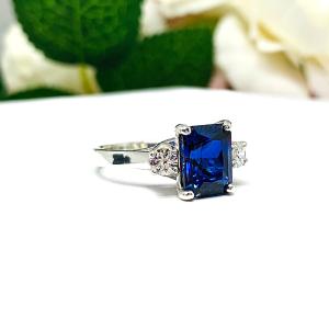 Lab Blue Sapphire Radiant Ring with Round CZ Accents Size 7