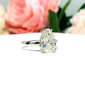 Pear Near Colorless 12x8mm Cubic Zirconia Wide Band Engagement Ring