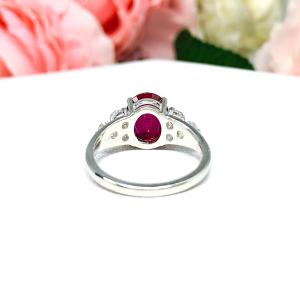Lab Created Ruby Oval Ring Round CZ Accented Sterling Silver
