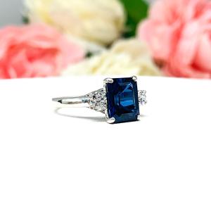 Lab Blue Sapphire Emerald Cut Ring Round CZ Accents