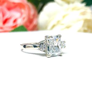Radiant CZ 9x7mm Sterling Silver Engagement Ring Round Accents