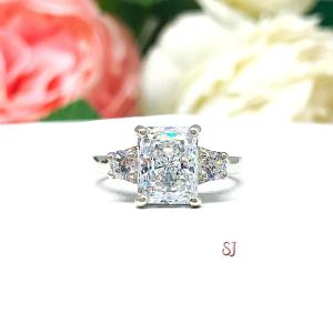Radiant CZ 9x7mm Sterling Silver Engagement Ring Round Accents