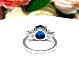 Lab Blue Sapphire and Cubic Zirconia Round Three Stone Ring