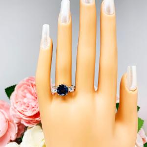 Lab Blue Sapphire and Cubic Zirconia Round Three Stone Ring