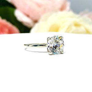 Round Near Colorless Cubic Zirconia Engagement Ring