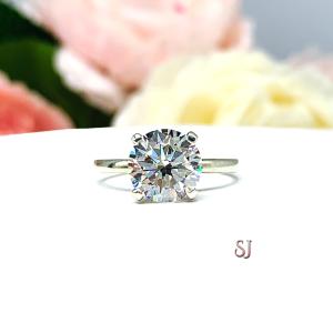 Round Near Colorless Cubic Zirconia Engagement Ring