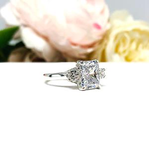 Radiant Cubic Zirconia Engagement Ring – 9x7mm, Round Accents, Sterling Silver