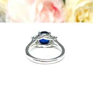 Lab Blue Sapphire Round 3-Stone Ring – Blue Moissanite Accents, Sterling Silver