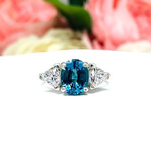 Teal Blue Oval 3-Stone Ring – CZ Trillion Accents, 9x7mm, 10x8mm, Nanocrystal Nanogem, Sterling Silver