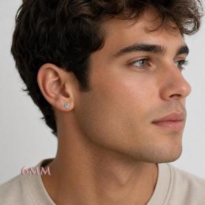 Woman wearing 6mm round blue moissanite martini stud earrings. Model image for size and styling reference — not a photo of the actual earrings.