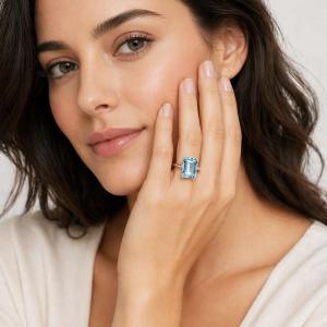Emerald-Cut Sky Blue Topaz Solitaire Ring • 14x10mm, Sterling Silver