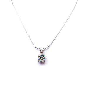 Sterling silver necklace with round-cut near colorless cubic zirconia pendant in a 4-prong basket setting with a lotus flower design.