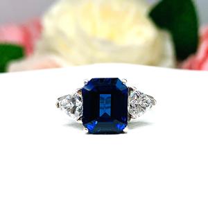 Emerald-Cut Lab Blue Sapphire & Trillion CZ 3-Stone Ring • 10x8mm, Sterling Silver, Size 7.75