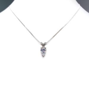 Sterling silver necklace featuring a pear-cut cubic zirconia with brilliant sparkle. The teardrop-shaped stone is inverted, creating a unique and modern look.