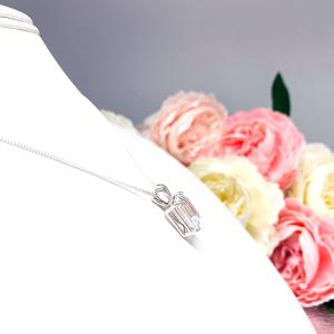 Sterling silver necklace featuring a 12x10mm emerald-cut lab-created white sapphire pendant in a 4-prong setting.