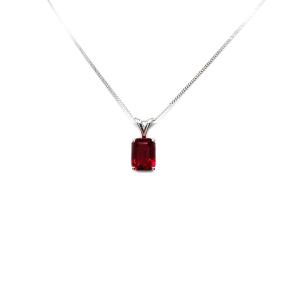 Sterling silver necklace featuring a 9x7mm emerald-cut lab-created ruby pendant in a 4-prong setting.