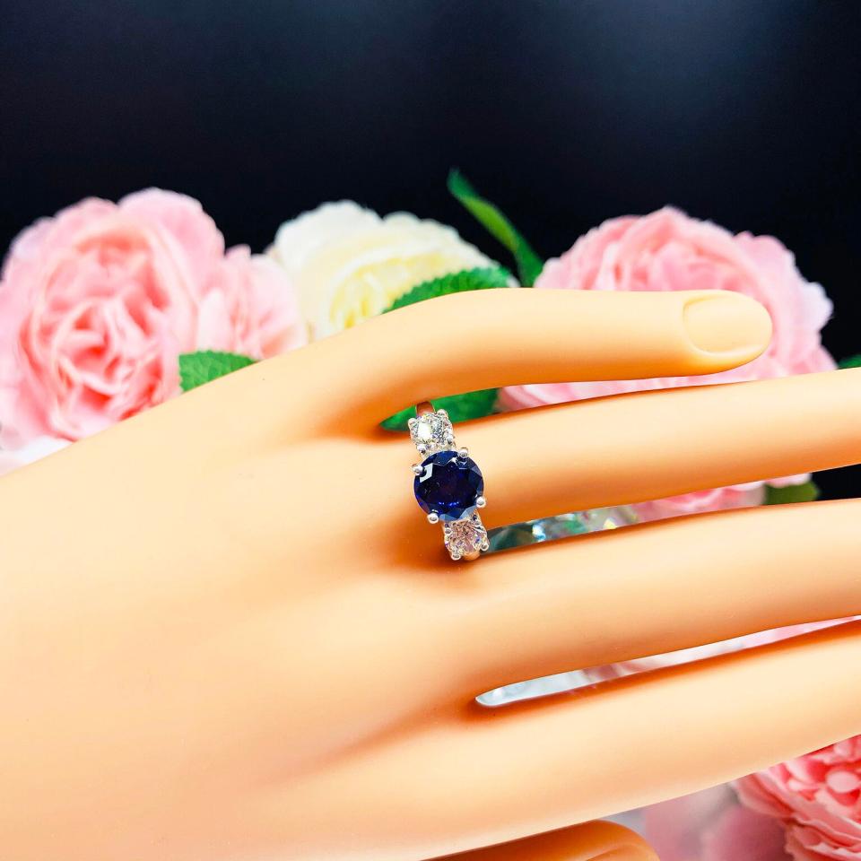 Lab Blue Sapphire and Cubic Zirconia Round Three Stone Ring