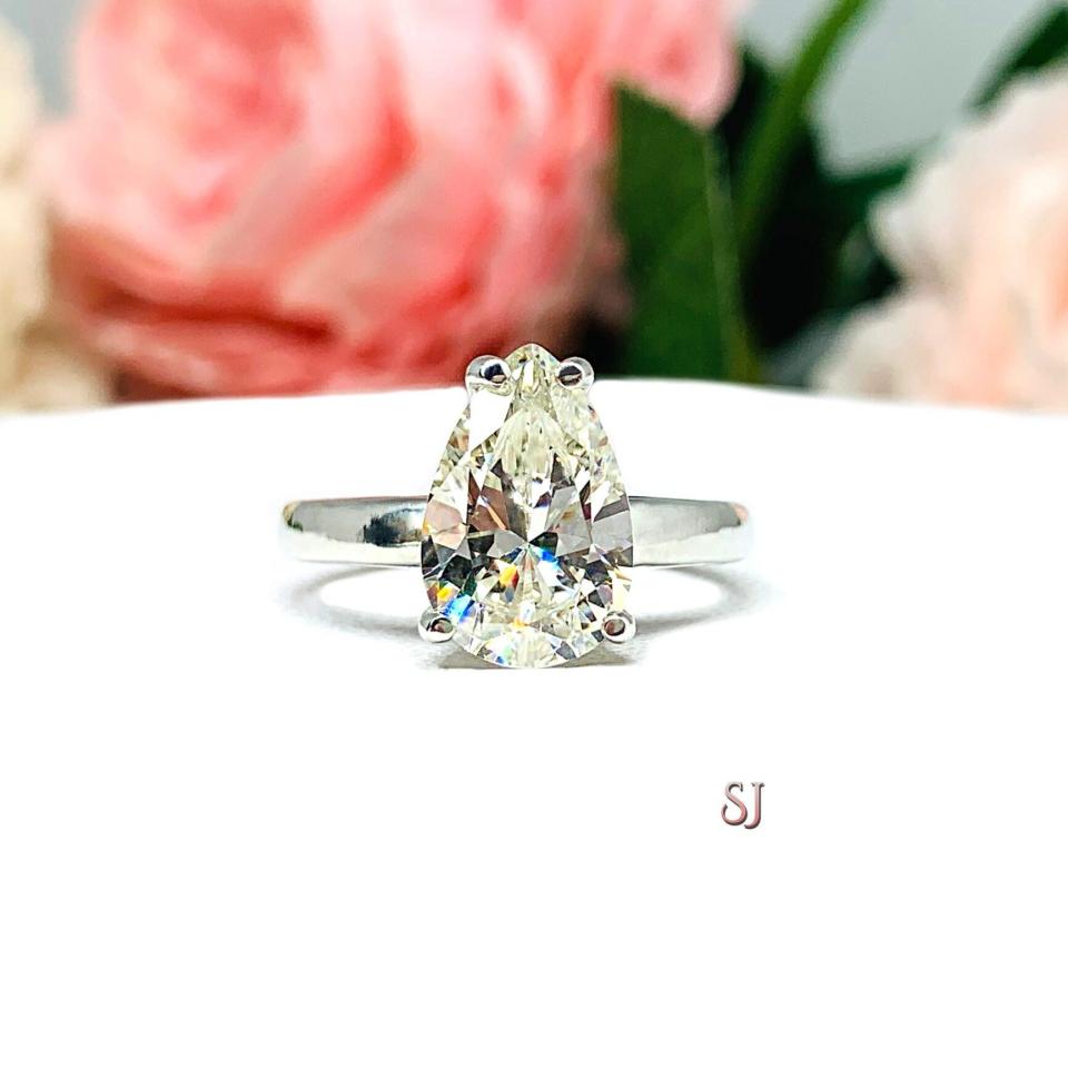 Pear Near Colorless 12x8mm Cubic Zirconia Wide Band Engagement Ring