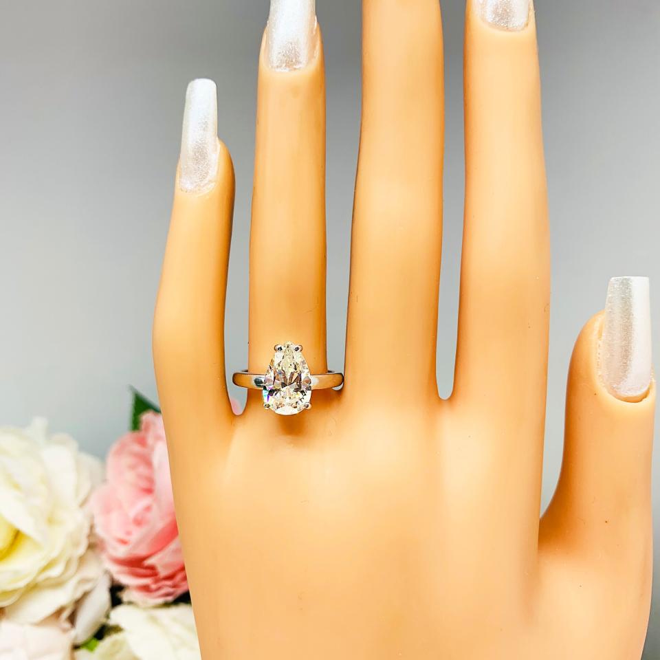 Pear Near Colorless 12x8mm Cubic Zirconia Wide Band Engagement Ring