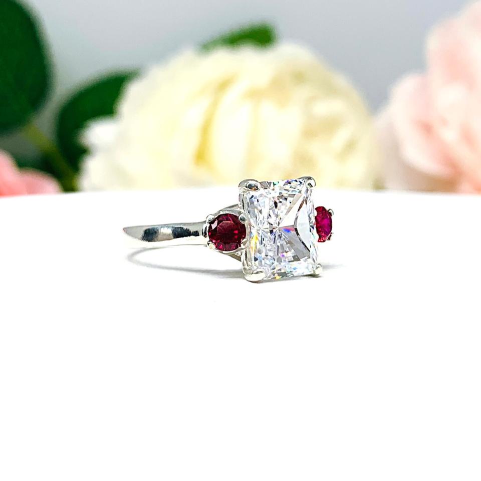 Diamond engagement ring hotsell with ruby accents