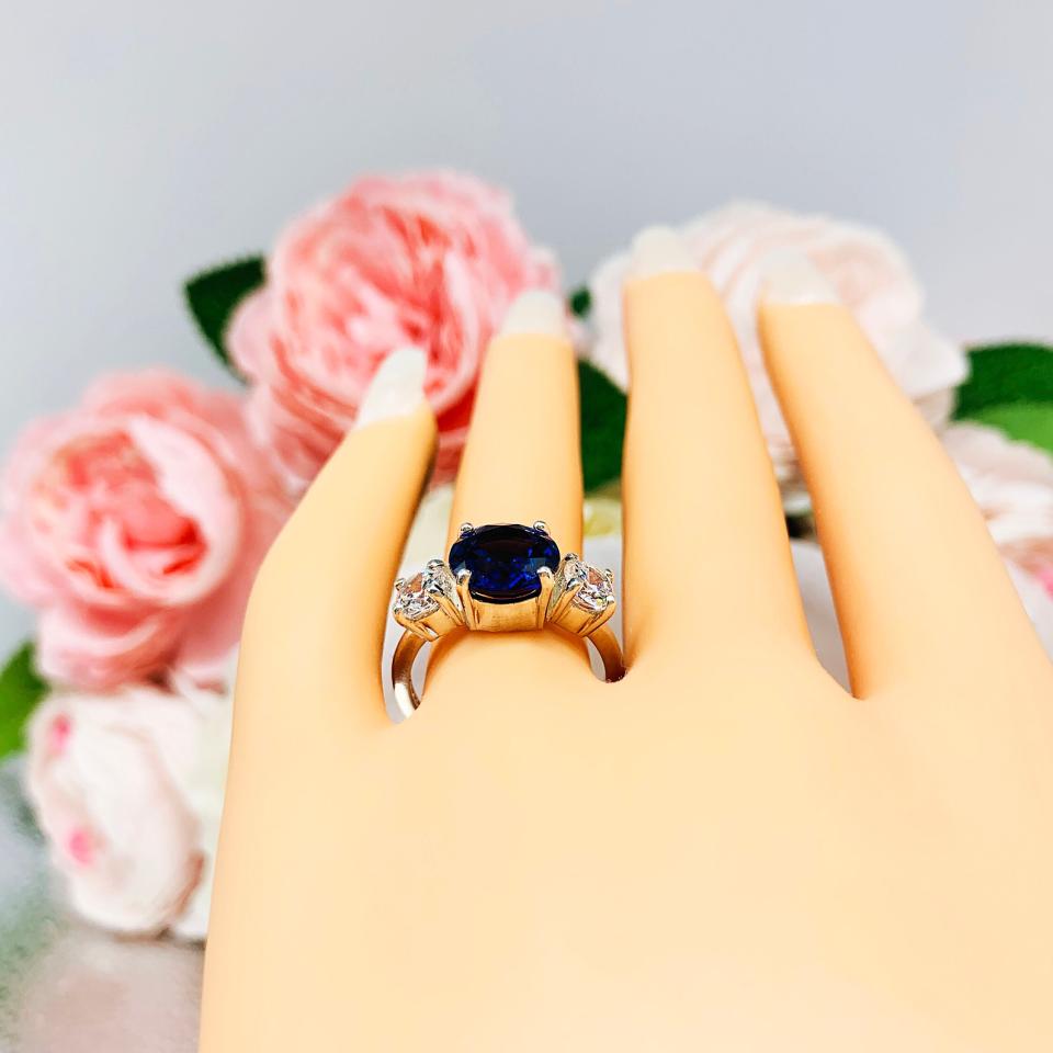 Lab Blue Sapphire and Cubic Zirconia Round Three Stone Ring
