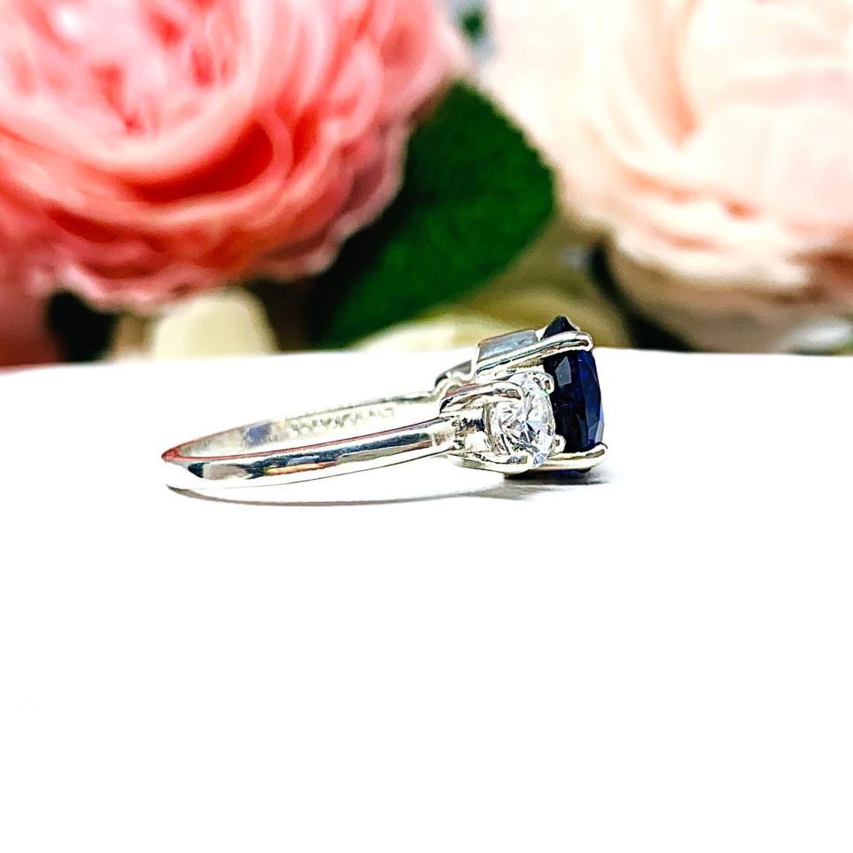 Lab Blue Sapphire and Cubic Zirconia Round Three Stone Ring