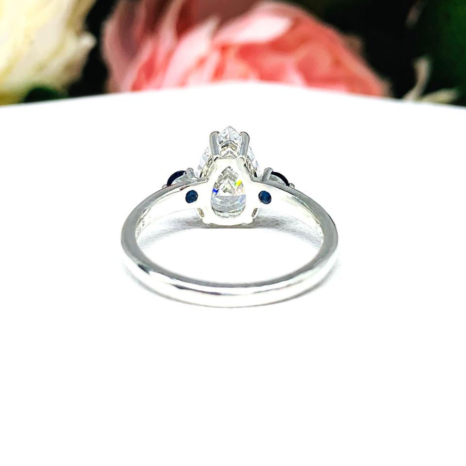 Pear CZ Lab Blue Sapphire Accents Engagement Ring