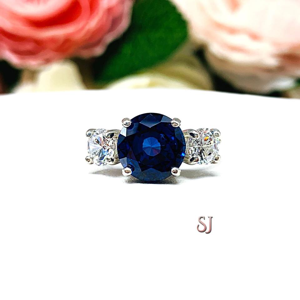 Lab Blue Sapphire and Cubic Zirconia Round Three Stone Ring