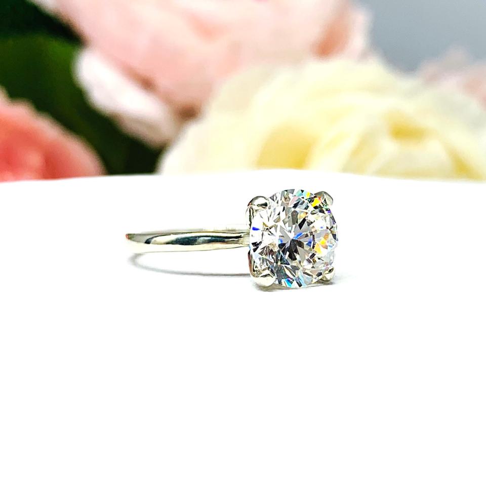 Round Near Colorless Cubic Zirconia Engagement Ring