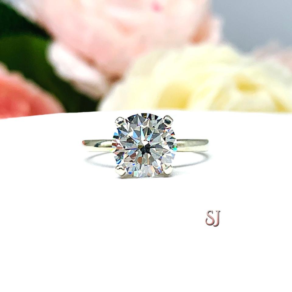 Round Near Colorless Cubic Zirconia Engagement Ring