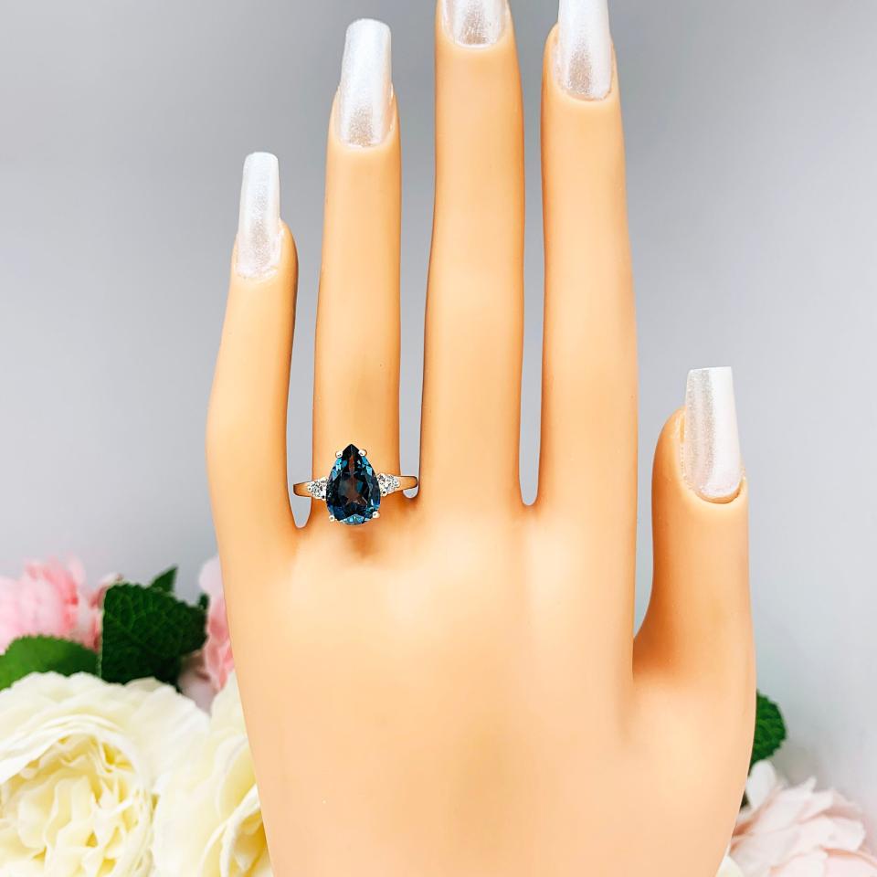 London Blue Topaz Pear Moissanite Ring - Sterling silver setting- Round moissanite side stones