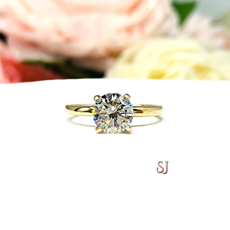 Round Near Colorless Cubic Zirconia Engagement Ring