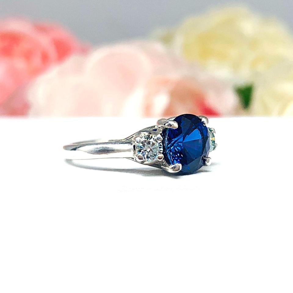 Lab Blue Sapphire Round 3-Stone Ring – Blue Moissanite Accents, Sterling Silver