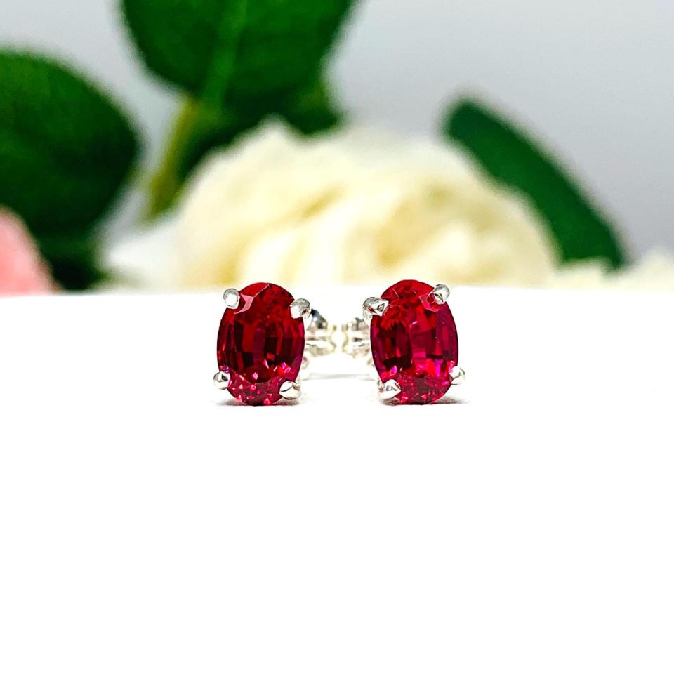 Oval-Cut Lab Ruby Stud Earrings • 7x5mm—9x7mm, Sterling Silver