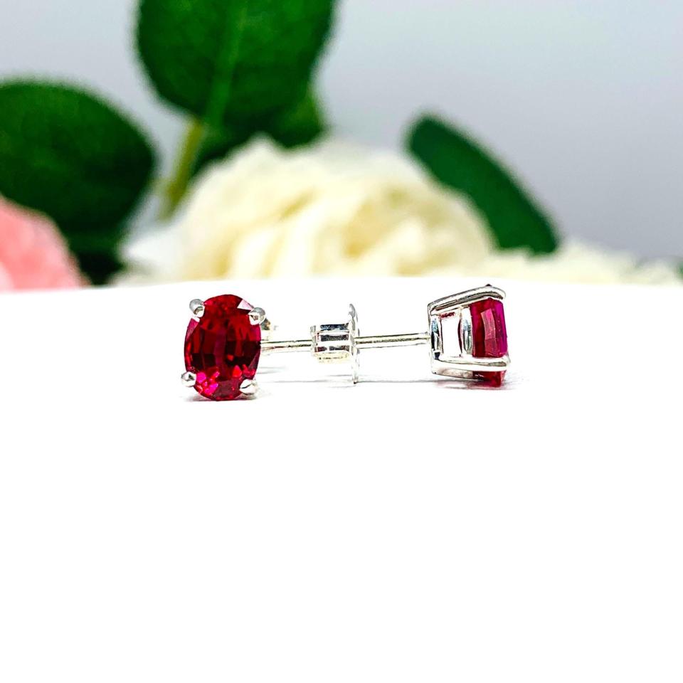 Oval-Cut Lab Ruby Stud Earrings • 7x5mm—9x7mm, Sterling Silver