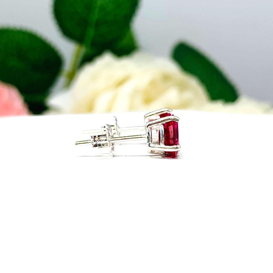 Oval-Cut Lab Ruby Stud Earrings • 7x5mm—9x7mm, Sterling Silver