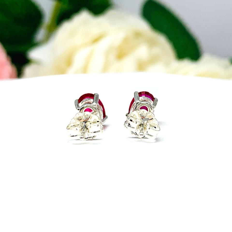 Oval-Cut Lab Ruby Stud Earrings • 7x5mm—9x7mm, Sterling Silver
