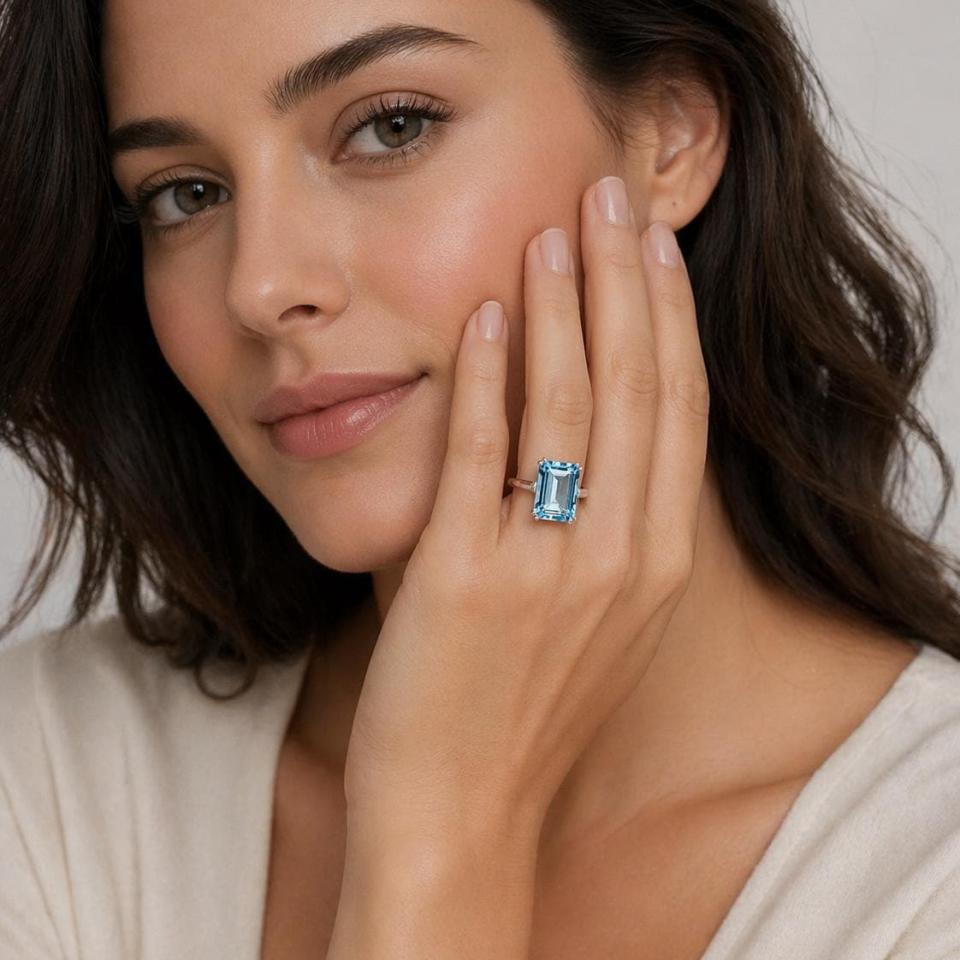 Emerald-Cut Sky Blue Topaz Solitaire Ring • 14x10mm, Sterling Silver