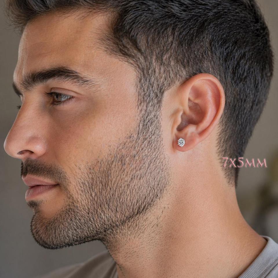 A man wearing 7x5mm oval cz 6-prong stud earrings. Model image for size and styling reference — not a photo of the actual earrings.