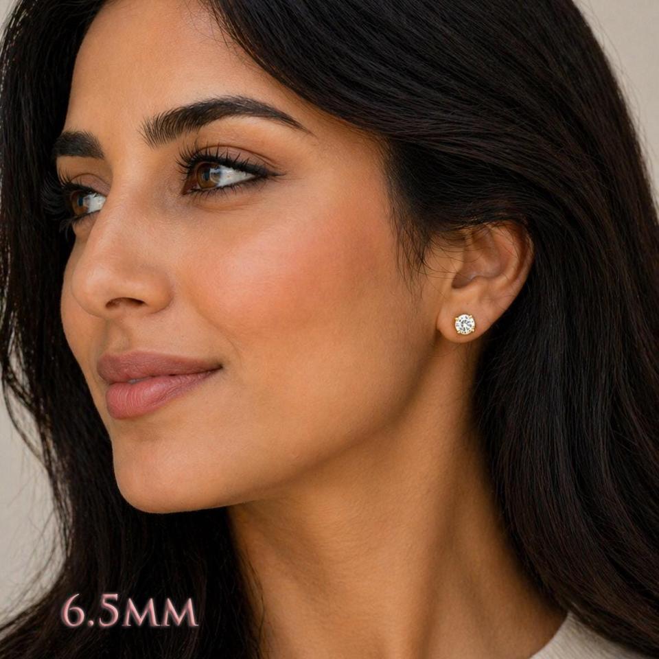A woman wearing 6.5mm old european cut cz stud earrings. Model image for size and styling reference — not a photo of the actual earrings.