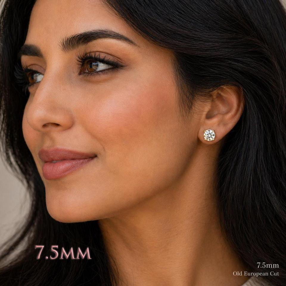 A woman wearing 7.5mm old european cut cz stud earrings. Model image for size and styling reference — not a photo of the actual earrings.