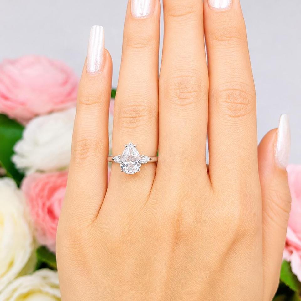 Pear-Cut Lab White Sapphire 3-Stone Ring • 10x7mm, 12x8mm, Round Accents, Sterling Silver