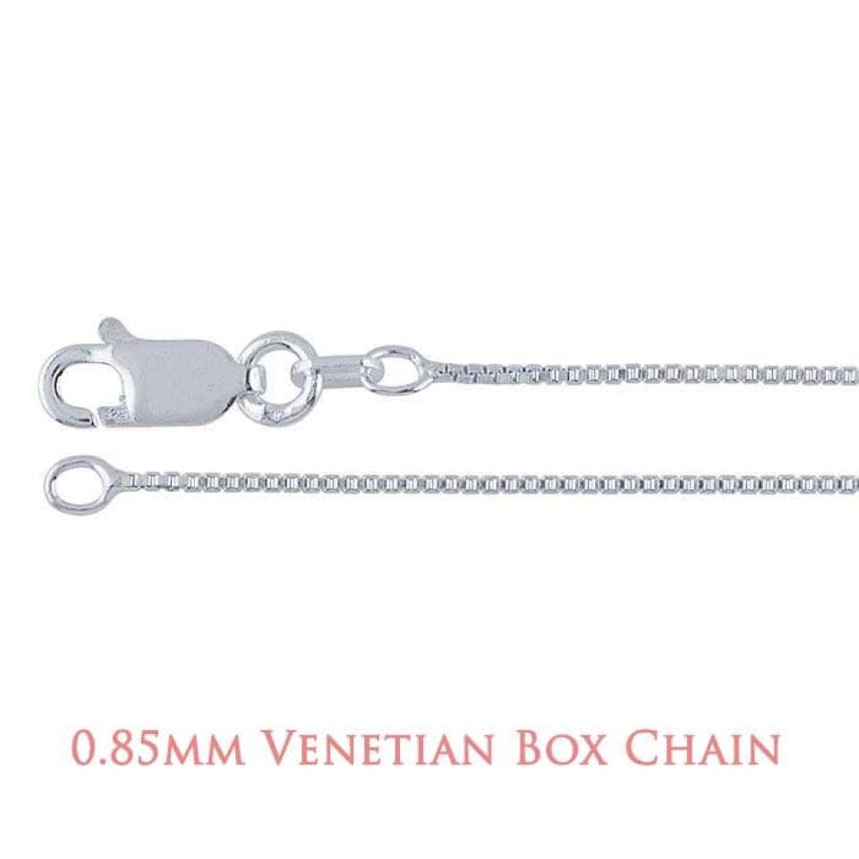 A close-up image of a sterling silver chain with a lobster clasp closure. The chain features a Venetian box design, composed of small, square-shaped links that fit tightly together in a smooth, uniform pattern. The metal surface is polished and reflective, giving the chain a sleek, modern appearance.  At the bottom of the image, text reads “0.85mm Venetian Box Chain” in a soft rose-colored font.