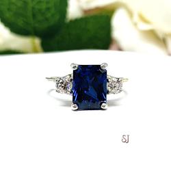 Lab Blue Sapphire Radiant Ring with Round CZ Accents Size 7