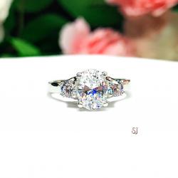 Oval 8x6mm Cubic Zirconia Round Accents Engagement Ring