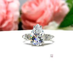 Pear Cubic Zirconia Round Accents Engagement Ring