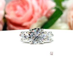 Round Cubic Zirconia Three Stone Tulip Engagement Ring