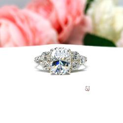 Oval Cubic Zirconia Round Accents Engagement Ring