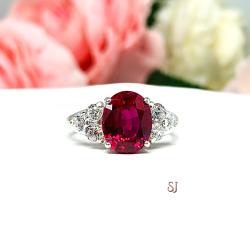 Lab Created Ruby Oval Ring Round CZ Accented Sterling Silver